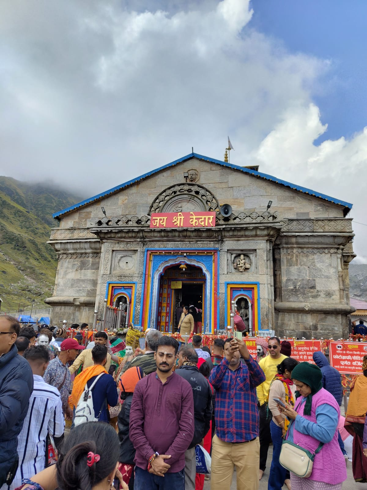 Kedarnath Temple during daytime with Himalayan peaks in the background