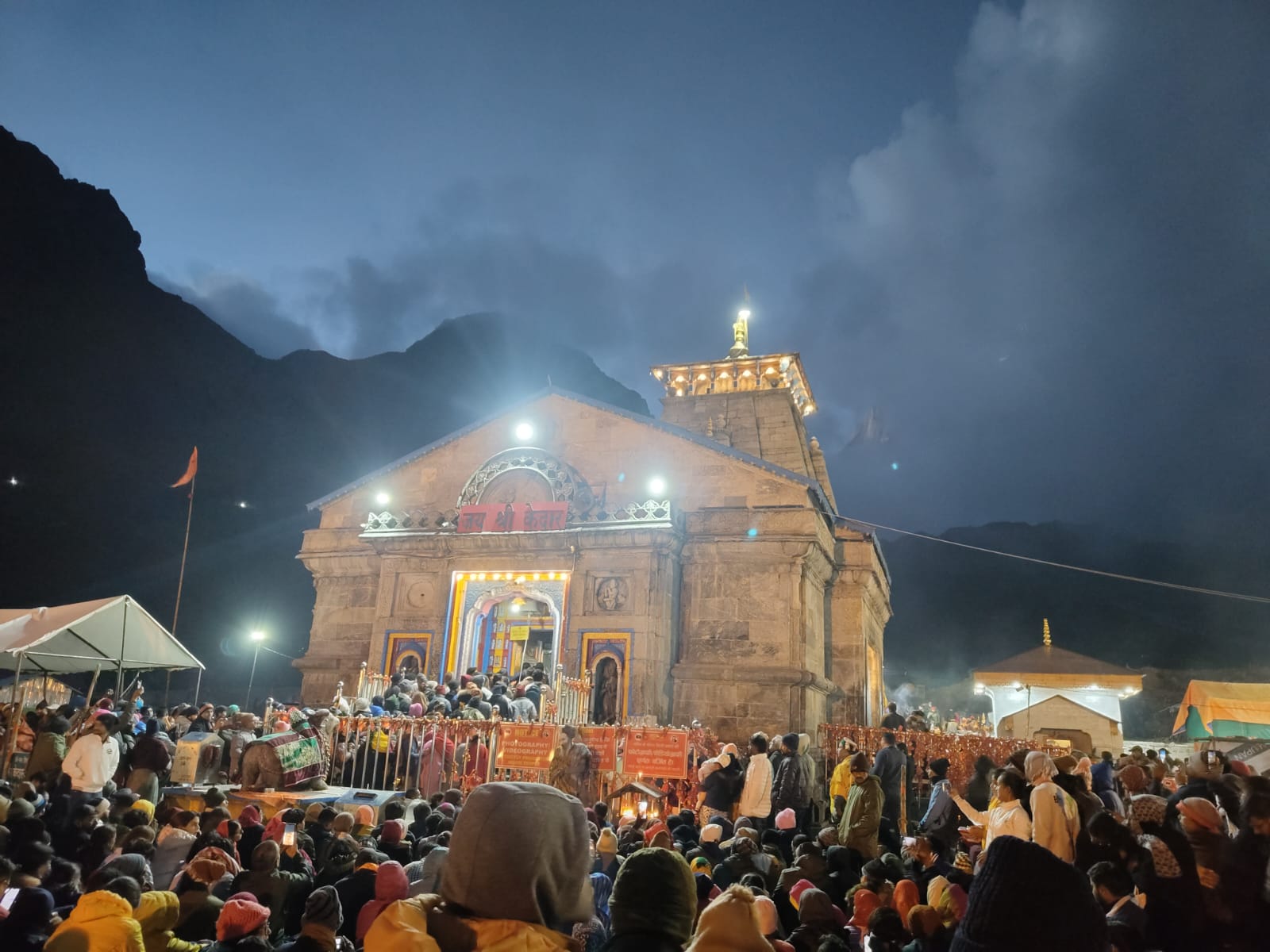 Evening aarti ceremony at Kedarnath Temple with devotees