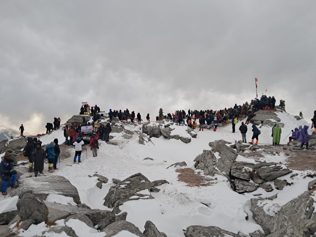 Hilltop view near Kedarnath with pilgrims gathered