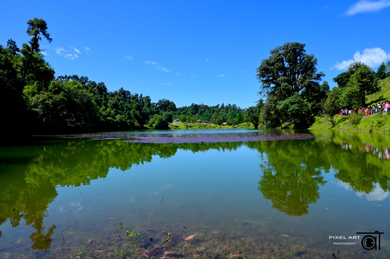 Deoria Tal lake with Chaukhamba peak reflection